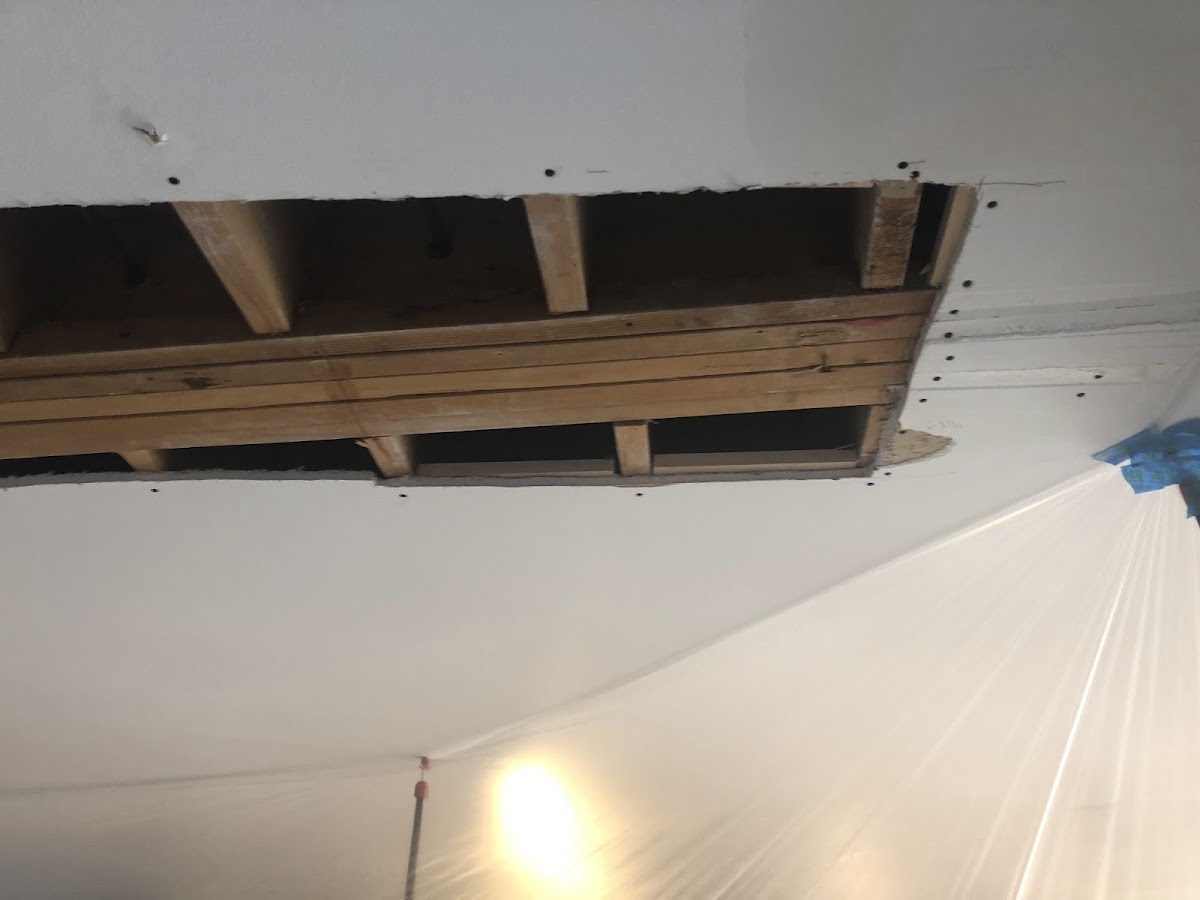 Ceiling joists exposed during a repair job