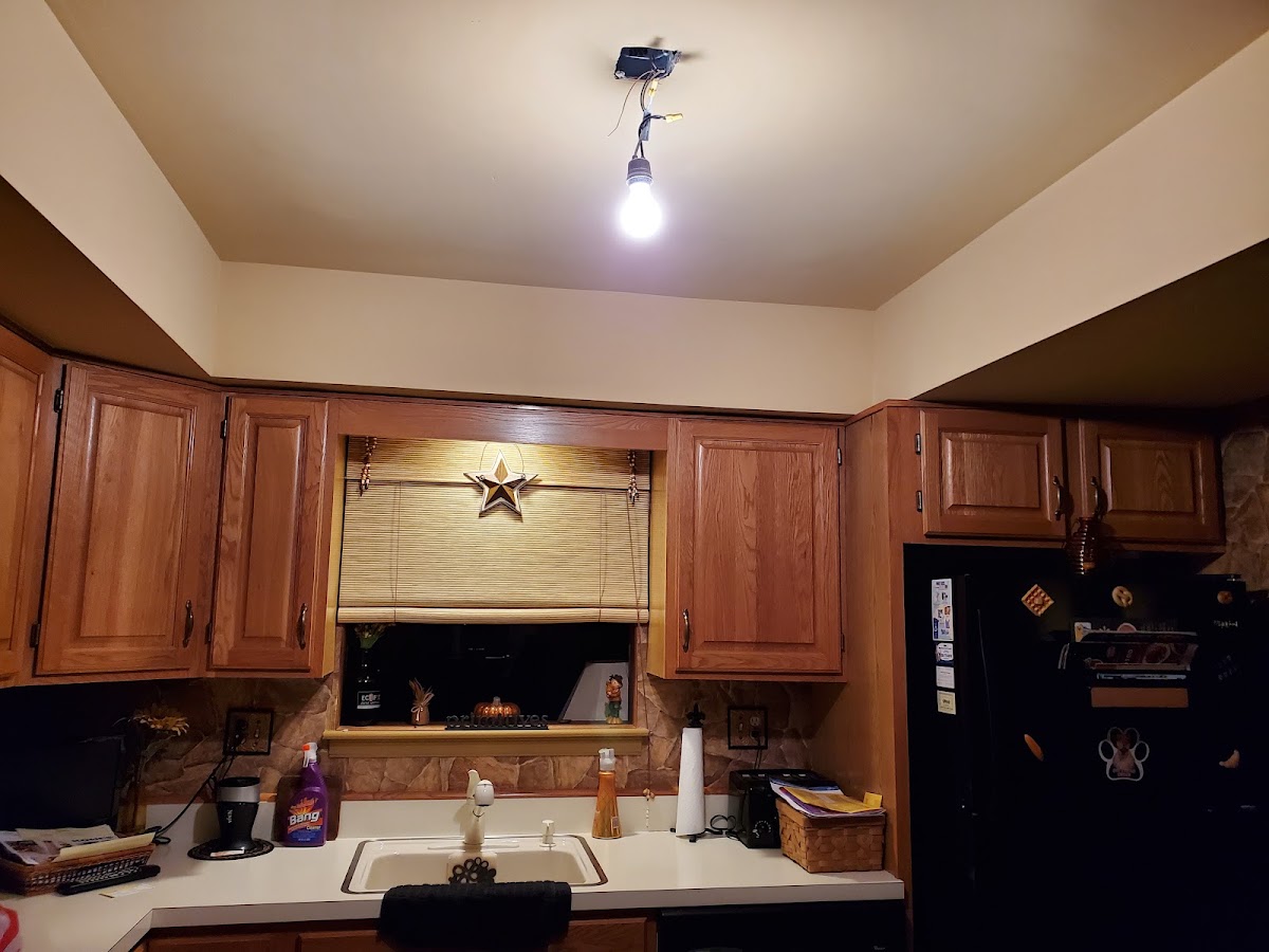 Kitchen light fixture mid-installation